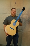 John with an instrument completed through the spray booth